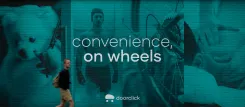 Wall billboard with man walking past, reading 'convenience, on wheels'.